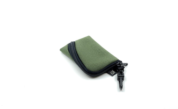 A Super Mini Ghost Whale Pouch in Boreal (green).